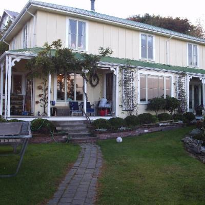 This is the front of the house, with the much used trampoline on the left, and spa at extreme right of house (not visible but just behind the railing you can see)